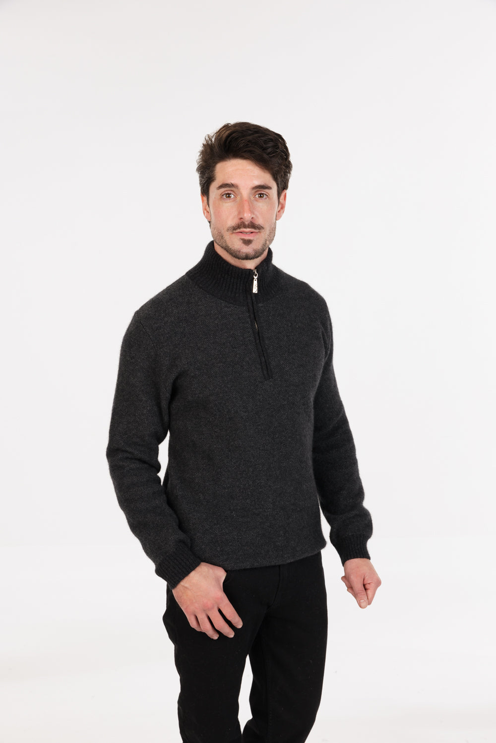 Model wearing men's possum merino & silk textured half-zip jumper in Charcoal